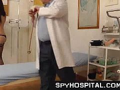 Courtesy of Spy Hospital you can see how a nasty brunette in black stockings gets examined naked by a horny doctor who can't wait to look at her sweet pussy.