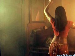 Check out this hottie coming straight from Bollywood. She shows her amazing dance moves then removes all of her clothes and shows off her perfect body, ready for sin.