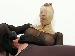 Fuckable blonde bitch with nice slim legs and hot tits covered in brown and black spandex pantyhose and even wears sheer nylons as a mask.