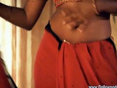 Gorgeous Indian slut's alluring solo teasing show. She will give you one phenomenal show that will make you want bollywood to the extremes with horny babes like her.