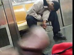 Jacking the dick on NYC train while guy sleep next to him
