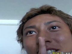 Tanned blonde Asian twink sucks cock and swallows cum. Watch this naughty Asian twink sucking this big fat cock and swallowing cumshot. This twink loves to stuff his mouth with a stiff dick. Enjoy!