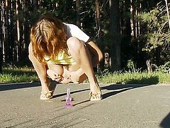 Cute women peeing in the forest