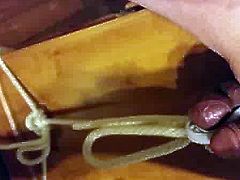 Testicle weight lifting