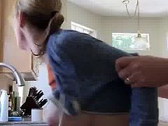 Nice MILF fuck from behind in the kitchen
