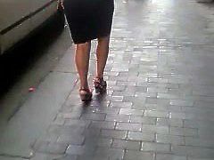 Classy woman with nice butt walks in Naples