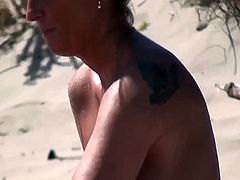 Hot Milf Masturbating on Beach