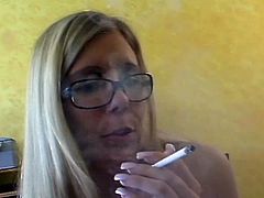 Nerdy blonde with tattoo and glasses gives POV blowjob to lucky big dick