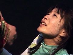This cute Japanese babe thinks cum tastes disgusting, but there is nothing she can do about that, because she is on her knees. The men jack off and shoot their spunk all over her pretty face, tits and into her mouth.