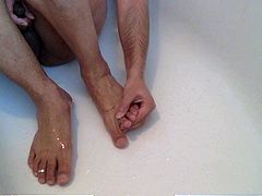 Gorgeous Male feet with toe rings in shower