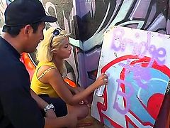Busty sexy pornstar Bridgette B in yellow tank top shows her juicy boobs to guy next door. She loves painting and he loves it too. Shes going to give his dick a try.