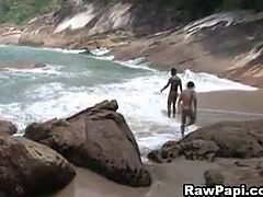 Hot Latino gay guys get naked on the beach and fuck