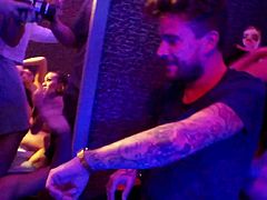 Skanky European pornstars having an orgy in a packed club