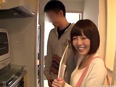 This lucky guy gets to meet one of the AV idols he worships. She surprises him in his apartment to suck on his cock and she discovers his huge collection of porn videos starring her. She uses her hand in unison with her mouth to get him off.