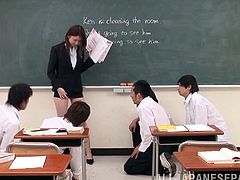 Teacher in a slutty skirt masturbates in front of the class