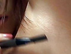 Risa Aihara sticks sex toys in her snatch