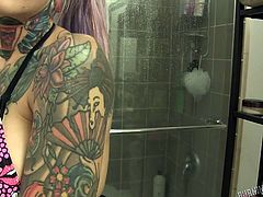I love chicks with tattoos. It just makes me horny thinking about their naked, inked bodies. Here at Burning Angel, those are basically the only girls featured. Today, we see behind two scenes, one with a blonde giving two guys head, the other with a lovely, glasses-wearing, tattooed goddess. It's hot!