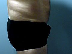 Daddy cums in new black nylon panties in swimming pool stall