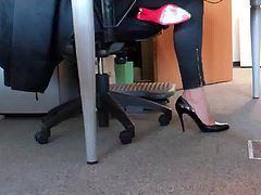 dangling her louboutin under desk 5