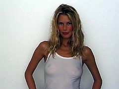 Claudia Schiffer showing nipples in a see-through shirt