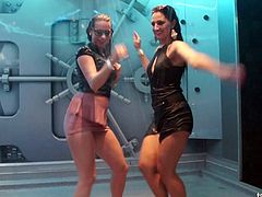 Fun girls getting soaking wet in a nightclub stage shower