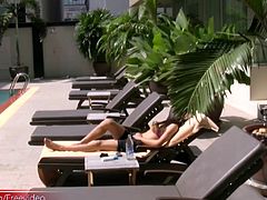 busty ladyboy is sucking big cock after modeling outdoors