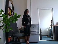 Black Angelika is in the office and she is getting a hard cock up her ass. Anyone can walk in on them as they are having an anal gangbang. Her tits are big and fake.