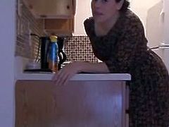 Hot stepmother Teases And Masturbates In Kitchen