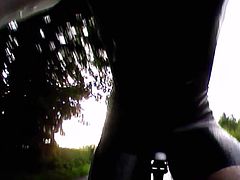 Latex cycling skinsuit in the rain