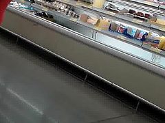 Mature latina at supermarket
