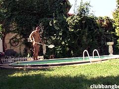 It's unbelievably hot out today and this guy can't clean the whole swimming area just walking around, not to mention that he's naked. His employer comes outside to check on him and sees what's going on. He likes that and starts getting down with his worker.