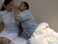 Kinky Japanese nurse would like the patient's cock inside her pussy