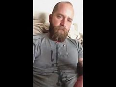 Hot bear strokes his dick and cum