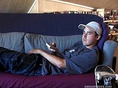 This 21 year old skater boy reclines on a sofa and rubs his bulge through some pretty heavy jeans and then, after unzipping, through the fly of his boxers. Getting stiffer, Mark shows off his nice boner, while staring into the camera. Mark prefers a steady lefthanded stroke, made his own by some damn nice wrist action. When he stands up close to the camera, to show off his boner in profile, youll notice, among other things, that his boxers come from Budweiser.