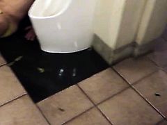 Captured during public pissing in bathroom