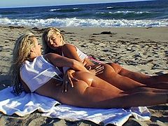 Anal Beach Buns stretched out in hot lesbian action