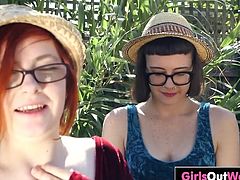 Horny Aussie lesbians with extremely hairy cunts Panda and Rosie give each other cunnilingus as they fuck in the garden