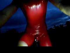 Night ride in latex cycling skinsuit