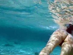 nude, preg, hairy girl swimming in sea