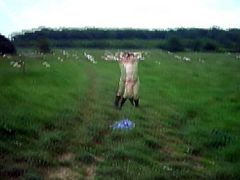 Small titted milf walking nude with the sheep