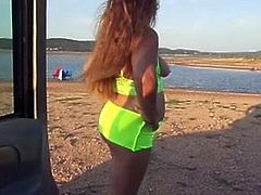 Smoking beach wife shows assets