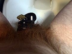 encage57 - slave caged does his first pee