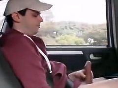 guy stroking in the backseat