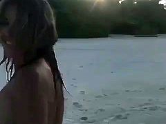 Elizabeth Hurley in bikini at the beach