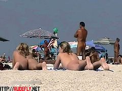 Blonde cutie undressing nudist beach voyeur video