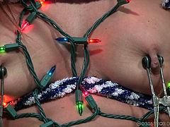 This time Maddy O'Reilly looks like a Christmas tree, but despite such a cheerful look, these ornaments on her naked body bring her incredible pain. Watch breathtaking bdsm and punishment! Have fun!