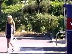 Asian babe with short dress pees outdoor near waste sorting