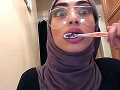 Hijabi Brushing her Pretty Teeth