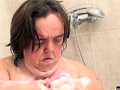 If youre into the whole midget, dwarf, little person fetish, this is a must see scene and Gidget is one of the most famous porn midgets in the industry. She uses that shower head right on her clit to work out an orgasm that has her body shuddering with pleasure.
