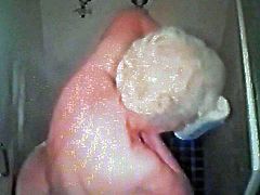 70+ wife plays with her pussy in the shower on hidden cam